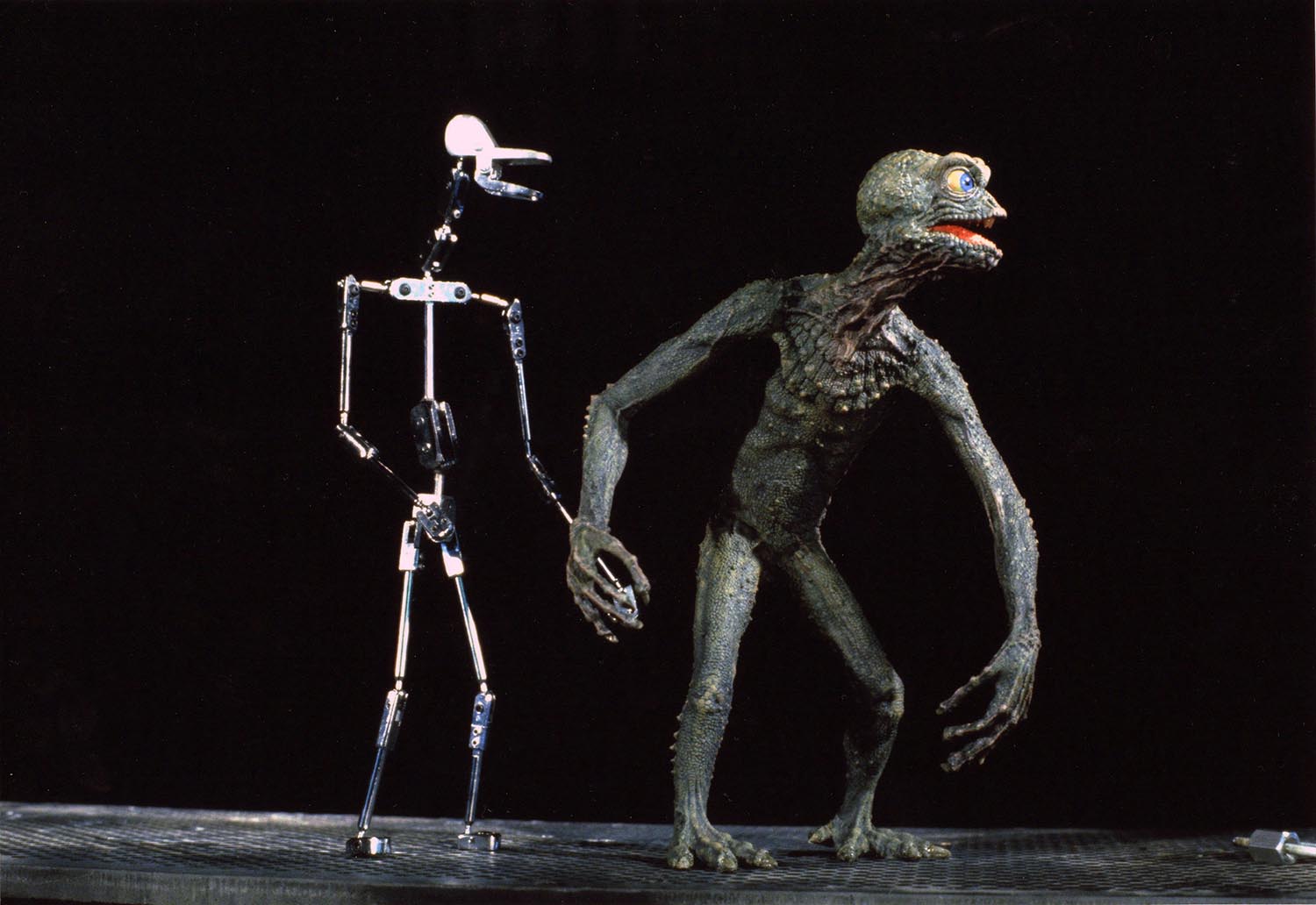 A side-by-side of the armature and the final model of the Lizard Men.